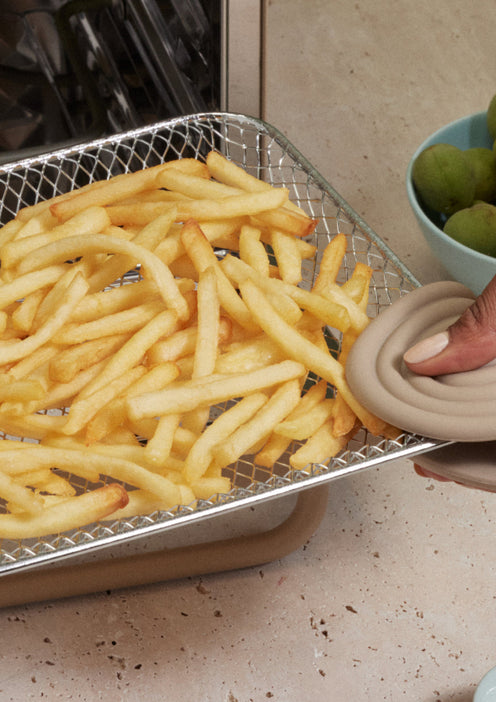 air frying french fries in beige wonder oven