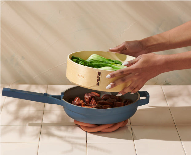 This handwoven steamer basket is the must-have sidekick for just-perfect, never-mushy dumplings, bao, veggies, and beyond. Compatible with all of our cookware.