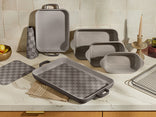 Set of gray cookware items on a kitchen counter
