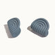 Two blue curved hair claw clips with a grooved, semi-circular design.