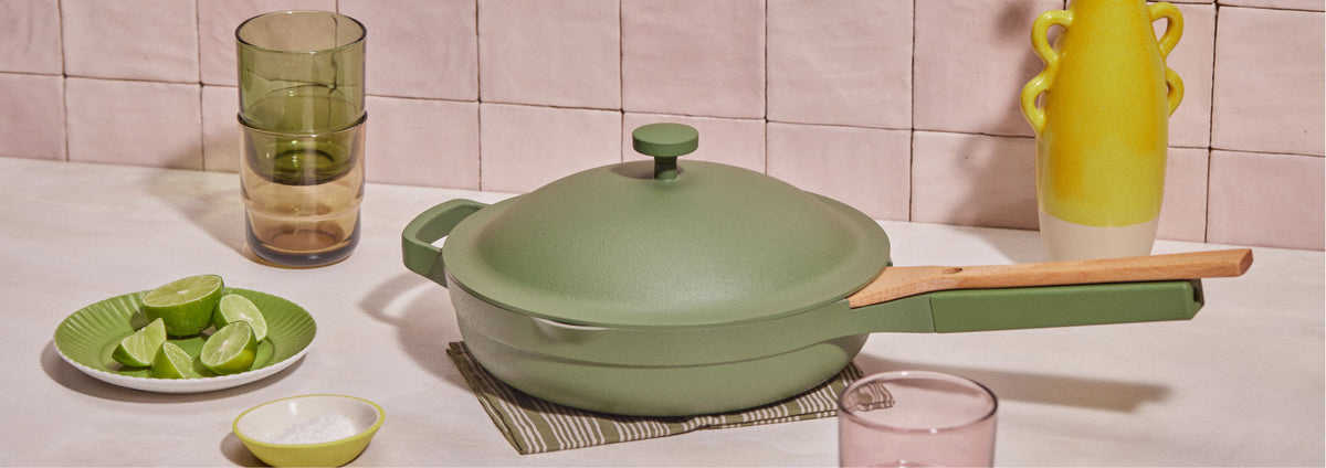 Translation missing: en.A green pot on a towel