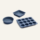 Wonder Oven Pro Baker’s Kit: blue non-toxic set with round cake pan, square dish, and 12-cup muffin pan on a light background.