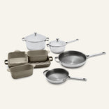 The Titanium Pro Cookware + Bakeware Set 2.0 includes two lidded pots, two frying pans, and three ceramic bakeware dishes.