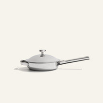 Titanium Always Pan Pro 20 cm 2.0 stainless steel frying pan with a light gray lid, a long handle, and a non-toxic design.