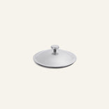 Round stainless steel Titanium Pro Lid (Mini) with a small knob handle.