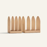 Two storage system holders on a light beige background