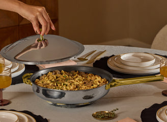 serving food in gold titanium large always pan pro on table