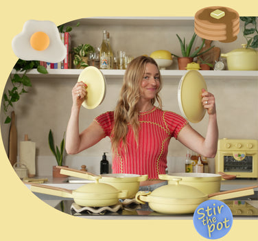 Woman in a kitchen holding yellow cookware with 'Stir the Pot' branding.