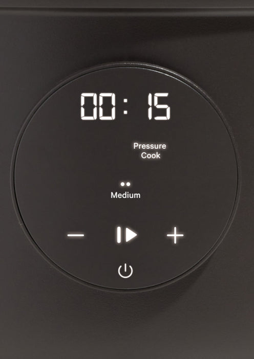 A digital control panel shows a timer set to 15 minutes, with pressure cook and medium settings, and buttons for power, start/pause, and adjusting time.