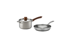 A stainless steel saucepan with a lid and brown handle next to a stainless steel frying pan with a silver handle, both on a plain white background.