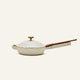 The Ceramic Nonstick Always Pan 20 cm, cream-colored with a matching lid and a long wooden handle, is displayed against a plain light background.